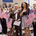 July 2 - PHOENIX, AZ: New US citizens take the oath of citizenship at South Mountain Community College in Phoenix, Friday. Nearly 200 people were sworn in as US citizens during the "Fiesta of Independence" at South Mountain Community College in Phoenix, AZ, Friday. The ceremony is an annual event on th 4th of July weekend and usually the largest naturalization ceremony of the year in the Phoenix area.  Photo by Jack Kurtz
