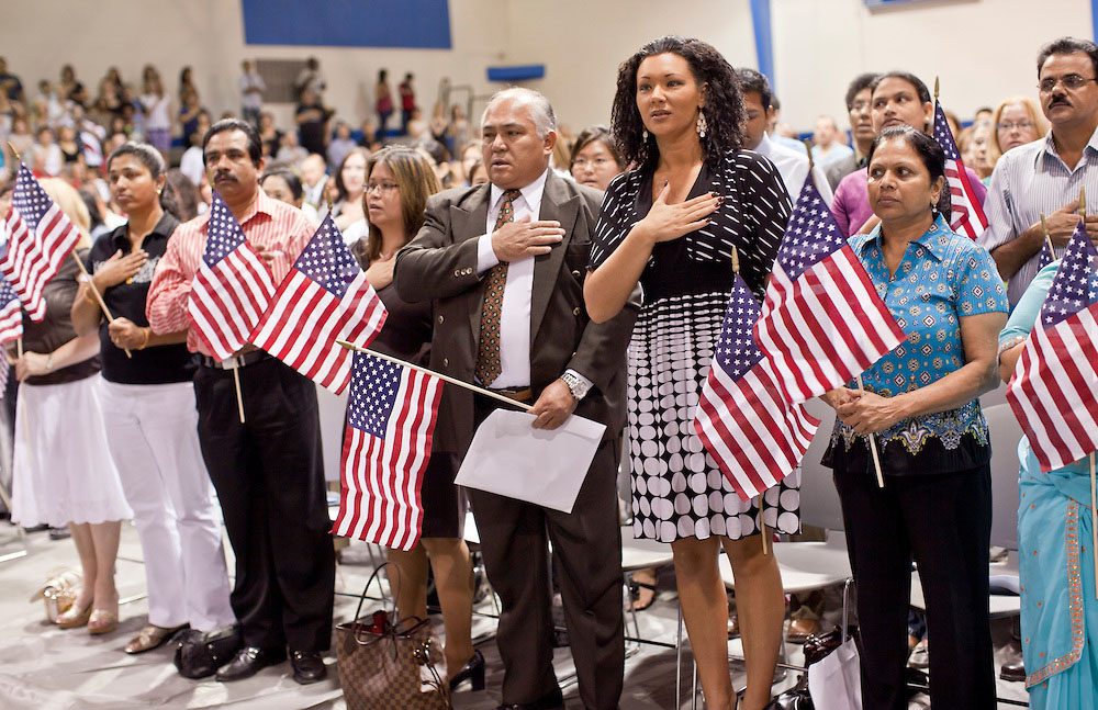 July 2 - PHOENIX, AZ: New US citizens take the oath of citizenship at South Mountain Community College in Phoenix, Friday. Nearly 200 people were sworn in as US citizens during the "Fiesta of Independence" at South Mountain Community College in Phoenix, AZ, Friday. The ceremony is an annual event on th 4th of July weekend and usually the largest naturalization ceremony of the year in the Phoenix area. Photo by Jack Kurtz